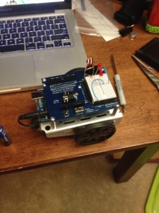 The freshly assembled BoEBot with my Arduino Uno R3 nestled inside.